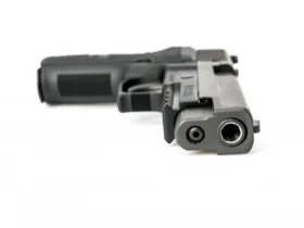 Quantos tiros tem uma Glock 18?